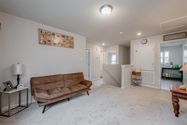 living room with light colored carpet