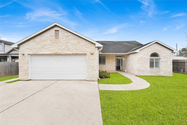 ranch-style house with a garage and a front lawn