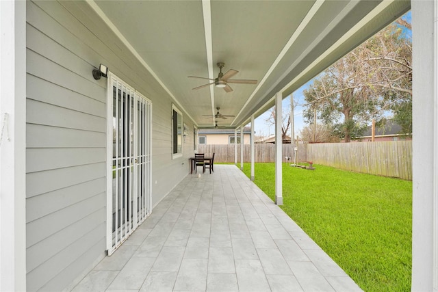 view of patio featuring ceiling fan