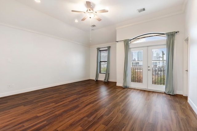 spare room with dark wood-type flooring, ceiling fan, and french doors