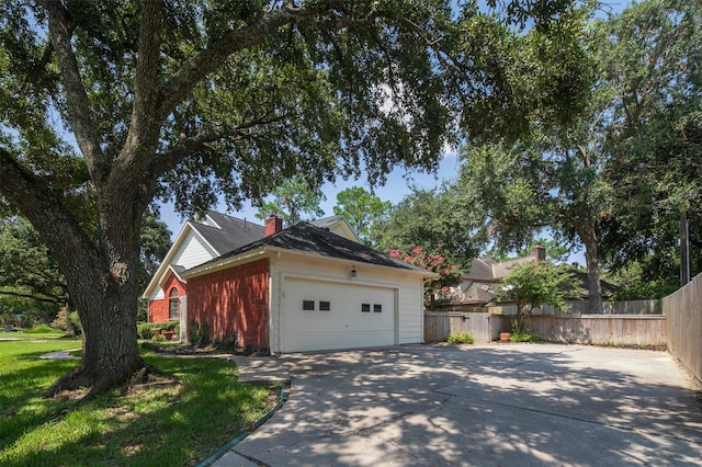 view of home's exterior with a garage