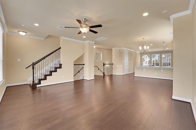 unfurnished living room featuring ornamental molding, dark wood-type flooring, and ceiling fan with notable chandelier