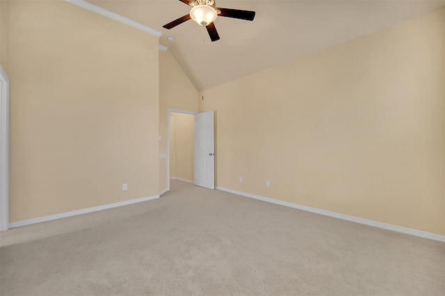 carpeted spare room featuring high vaulted ceiling and ceiling fan