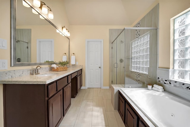 bathroom with vanity and plus walk in shower