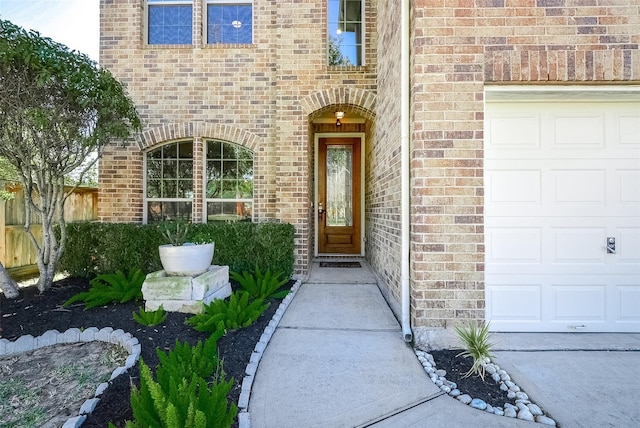 doorway to property featuring a garage