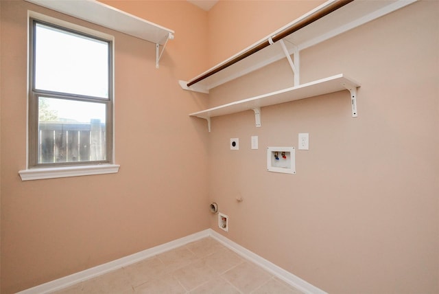 laundry area featuring hookup for a gas dryer, hookup for a washing machine, and electric dryer hookup