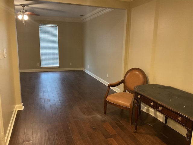 unfurnished room featuring dark hardwood / wood-style flooring, ornamental molding, and ceiling fan