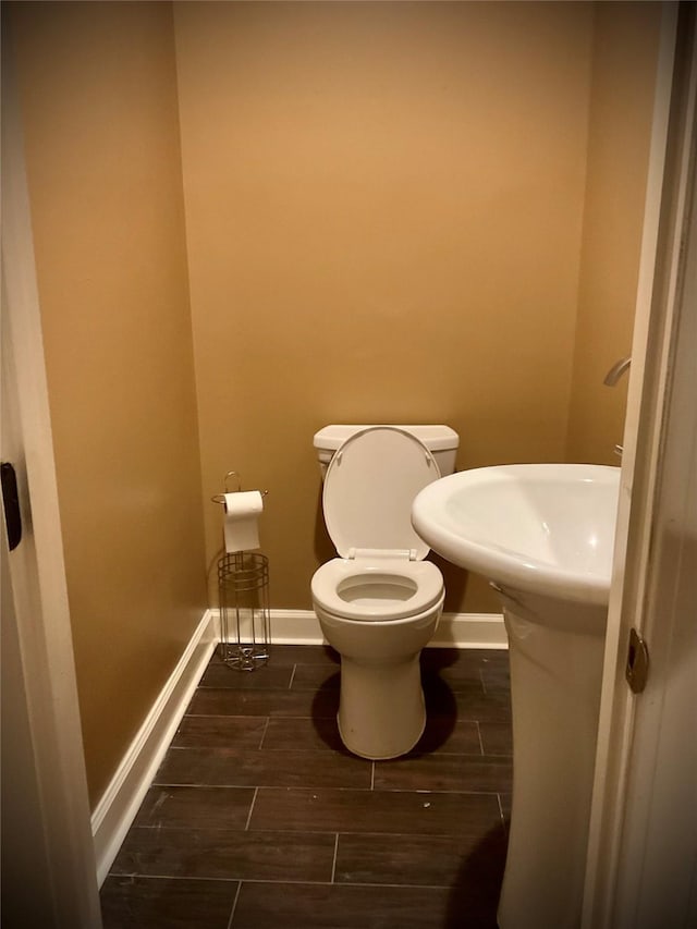 bathroom featuring toilet