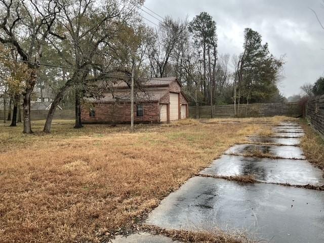 view of yard with a garage