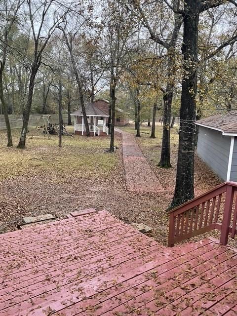 view of yard with a wooden deck