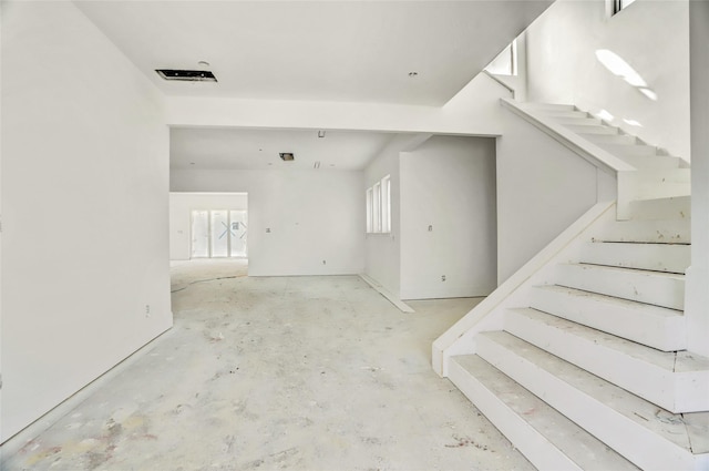 interior space featuring concrete flooring