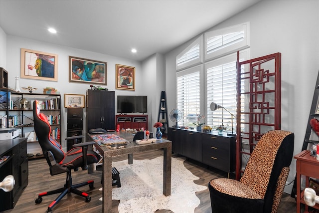 home office with dark wood-type flooring