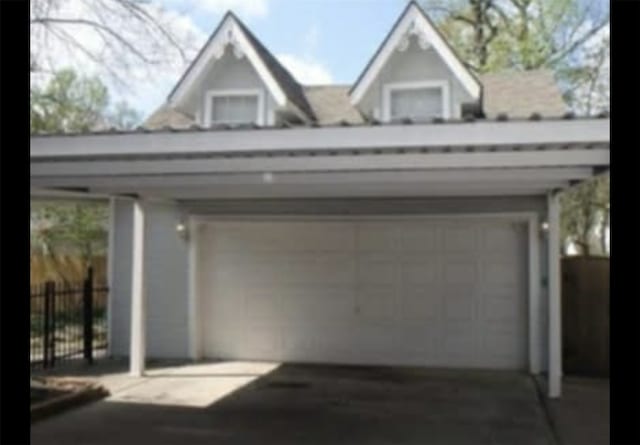 garage with a carport