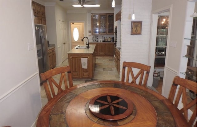 dining room featuring sink