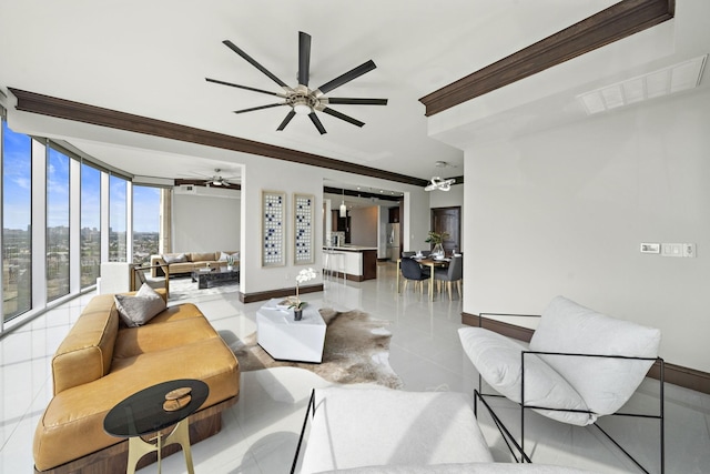 tiled living room featuring a wall of windows, ornamental molding, and ceiling fan