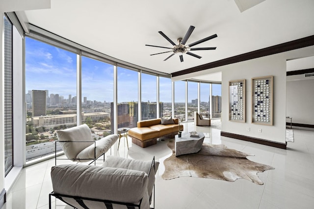 tiled living room featuring floor to ceiling windows and ceiling fan