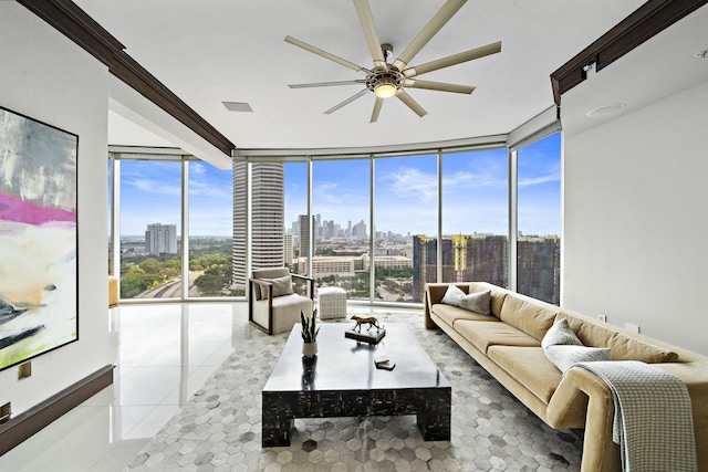 living room with light tile patterned floors, floor to ceiling windows, and ceiling fan