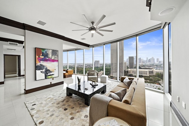 tiled living room with expansive windows, a wealth of natural light, and ceiling fan