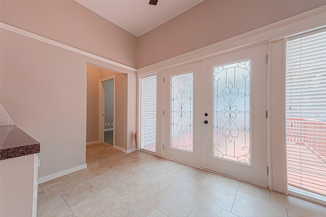 foyer entrance featuring french doors