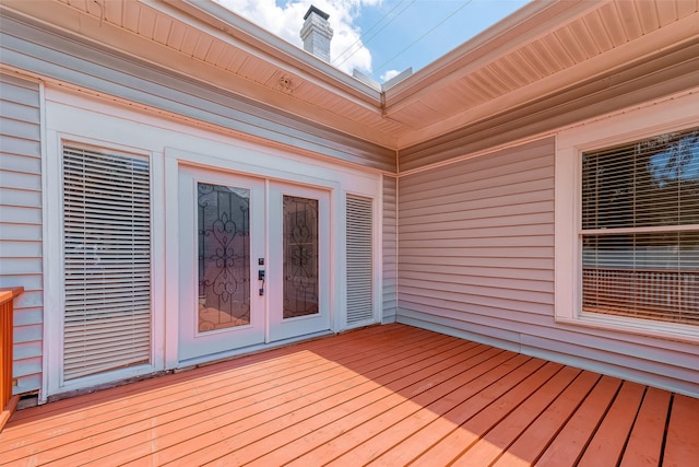 wooden deck featuring french doors