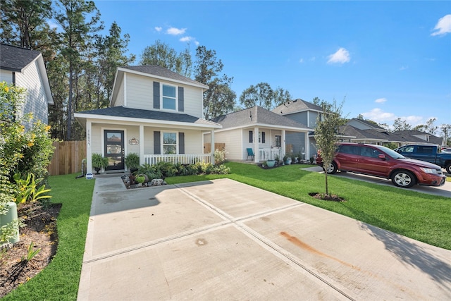 view of front of property featuring a porch and a front lawn