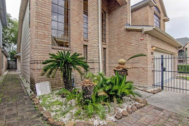 view of side of property with a garage