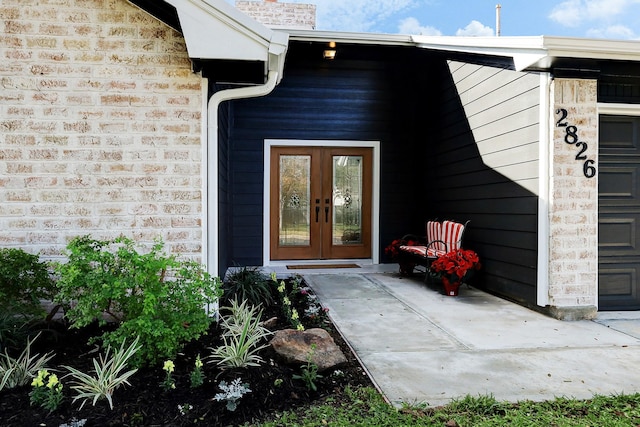 property entrance featuring french doors