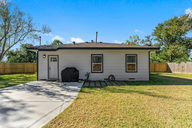 exterior space with a yard and a patio