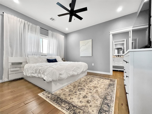 bedroom featuring ceiling fan and light wood-type flooring