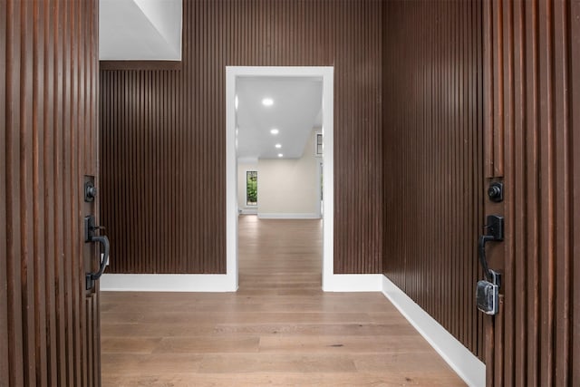 entryway with light hardwood / wood-style floors