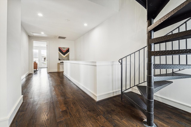 corridor with dark hardwood / wood-style floors