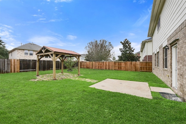 view of yard featuring a gazebo and a patio