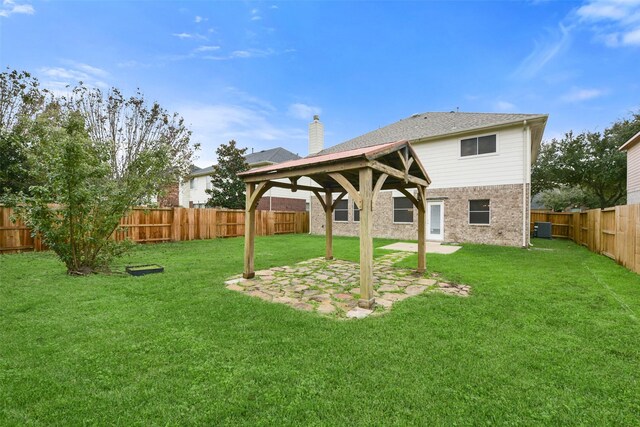 back of property featuring a patio area, a lawn, and central air condition unit