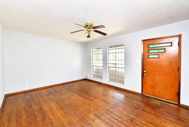 entrance foyer featuring hardwood / wood-style flooring and ceiling fan