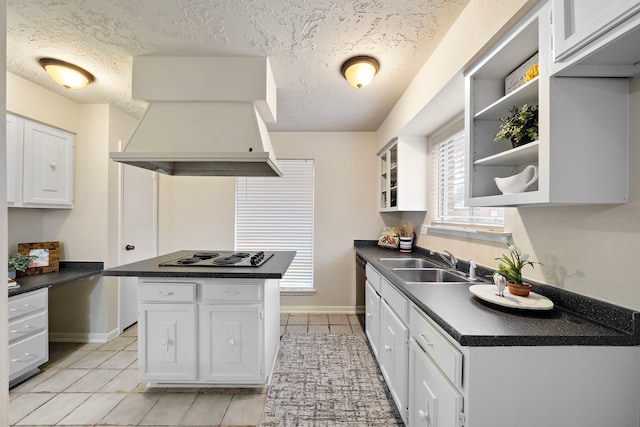 kitchen featuring sink, exhaust hood, white cabinets, and black appliances