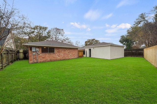 rear view of property featuring a yard