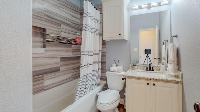 full bathroom with toilet, vanity, and shower / bathtub combination with curtain