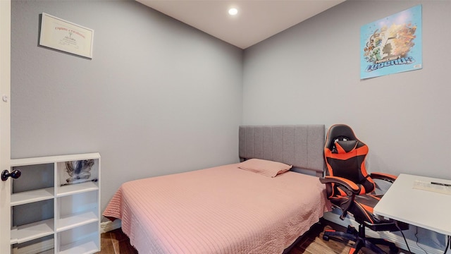 bedroom featuring hardwood / wood-style flooring