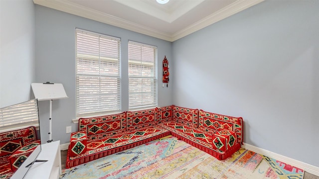 sitting room with crown molding