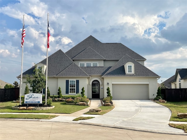 view of front facade featuring a front yard