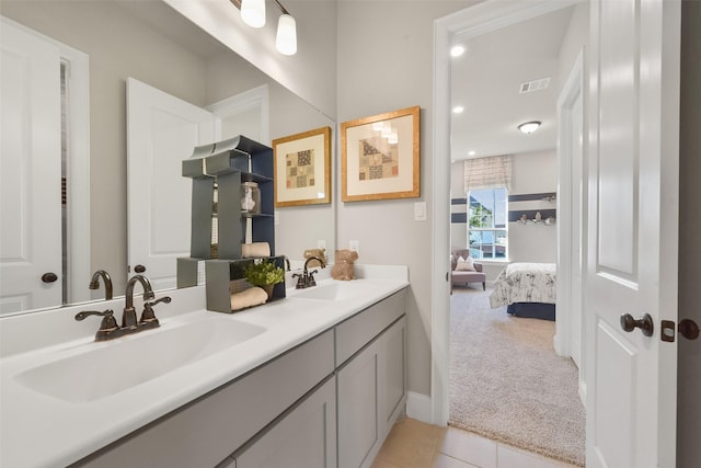 bathroom featuring vanity and tile patterned floors