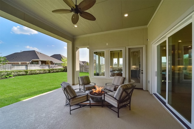 view of patio / terrace featuring a fire pit and ceiling fan