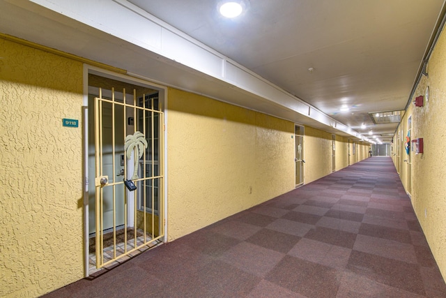 corridor featuring carpet flooring