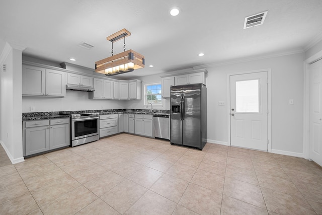 kitchen with ornamental molding, stainless steel appliances, decorative light fixtures, and gray cabinets