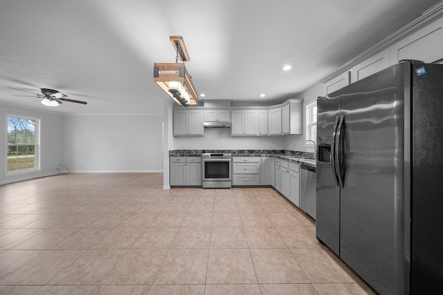 kitchen featuring gray cabinets, sink, light tile patterned floors, ceiling fan, and stainless steel appliances