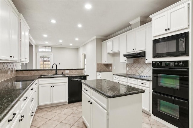 kitchen featuring a kitchen island, sink, white cabinets, and black appliances