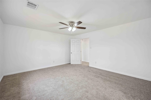 empty room with carpet floors and ceiling fan