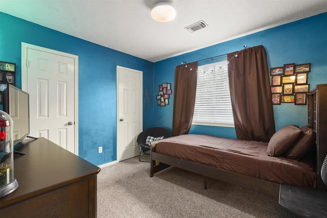 bedroom featuring carpet