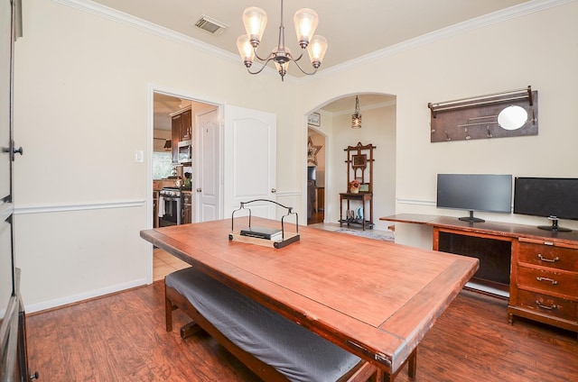 office with dark hardwood / wood-style flooring, ornamental molding, and an inviting chandelier