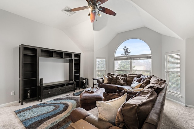 living room with vaulted ceiling, ceiling fan, and carpet floors